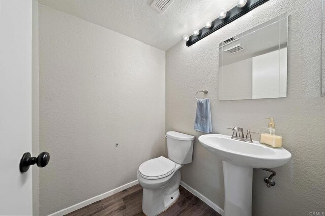 9560 Frank Way, Santee, CA 92071 - bathroom featuring wood finished floors and toilet