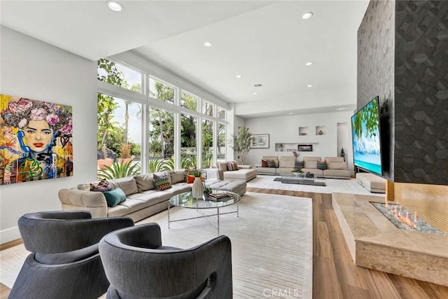 18782 Peppertree Dr, Villa Park, CA 92861 - living area with wood finished floors, recessed lighting, and baseboards
