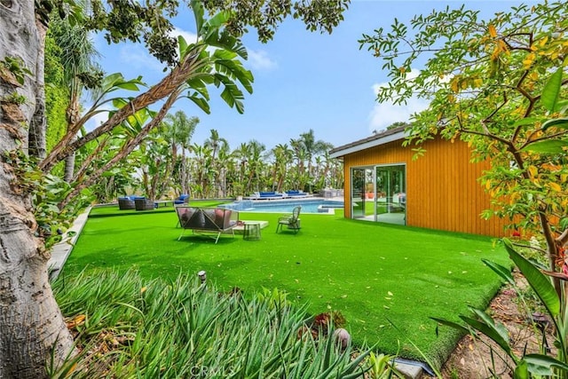 18782 Peppertree Dr, Villa Park, CA 92861 - view of green lawn featuring an outdoor pool
