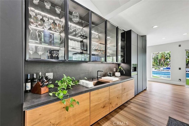 18782 Peppertree Dr, Villa Park, CA 92861 - indoor wet bar with wood finished floors and recessed lighting