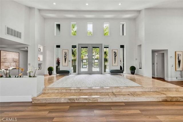 18782 Peppertree Dr, Villa Park, CA 92861 - foyer featuring a high ceiling, french doors, healthy amount of natural light, wood finished floors, and recessed lighting