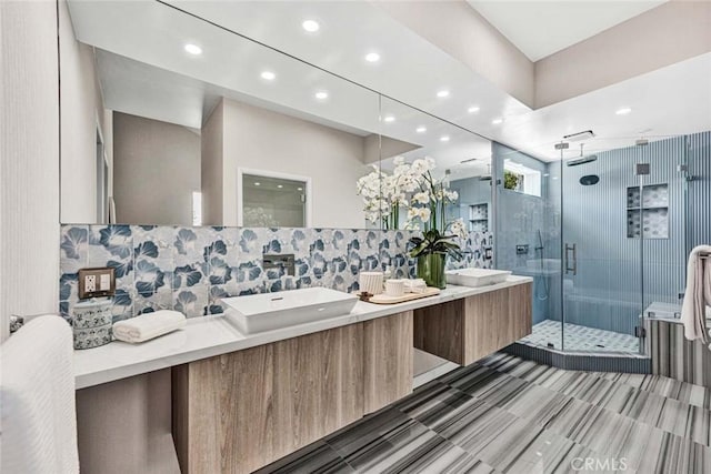18782 Peppertree Dr, Villa Park, CA 92861 - bathroom with a stall shower, recessed lighting, backsplash, and double vanity