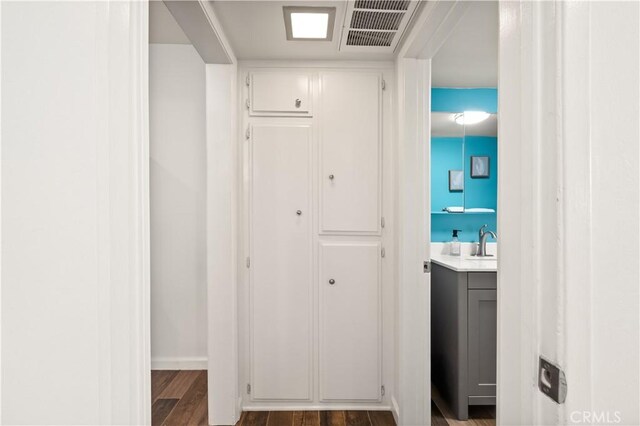 1015 N Michillinda Ave Unit 104, Pasadena, CA 91107 - corridor featuring wood finished floors, a sink, and baseboards