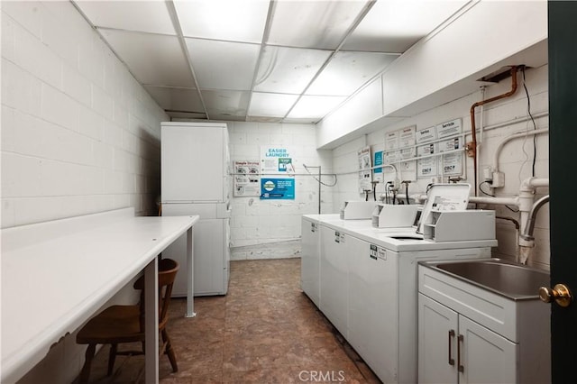 1015 N Michillinda Ave Unit 104, Pasadena, CA 91107 - shared laundry featuring washer and clothes dryer and concrete block wall