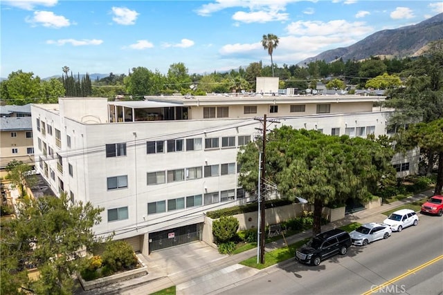 1015 N Michillinda Ave Unit 104, Pasadena, CA 91107 - view of building exterior with a mountain view