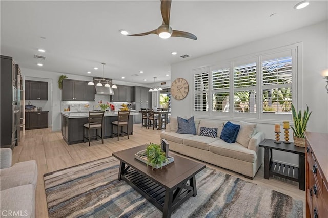 32404 Old Sage Dr, San Juan Capistrano, CA 92675 - living area featuring a ceiling fan, recessed lighting, and light wood-type flooring
