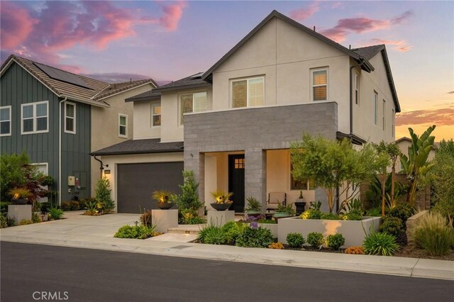 32404 Old Sage Dr, San Juan Capistrano, CA 92675 - view of front of home with a garage, driveway, and stucco siding