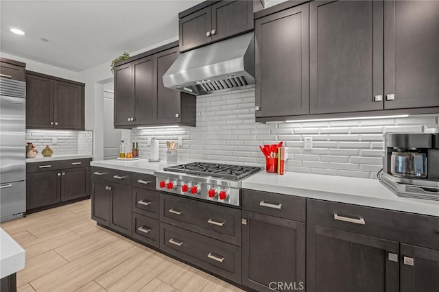 32404 Old Sage Dr, San Juan Capistrano, CA 92675 - kitchen featuring under cabinet range hood, appliances with stainless steel finishes, light countertops, and backsplash