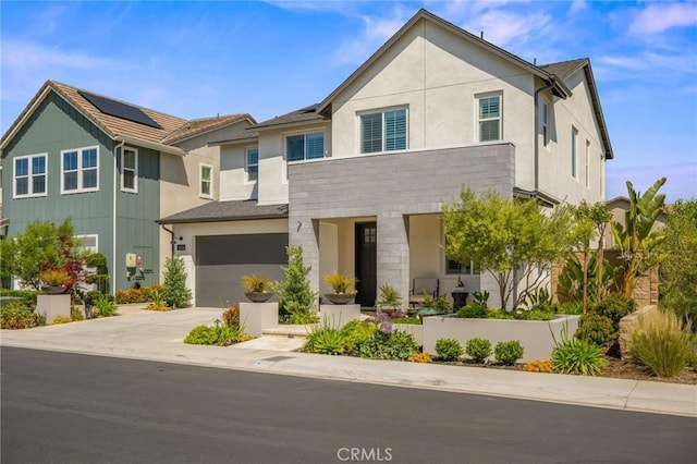 32404 Old Sage Dr, San Juan Capistrano, CA 92675 - view of front facade with a garage, concrete driveway, and stucco siding