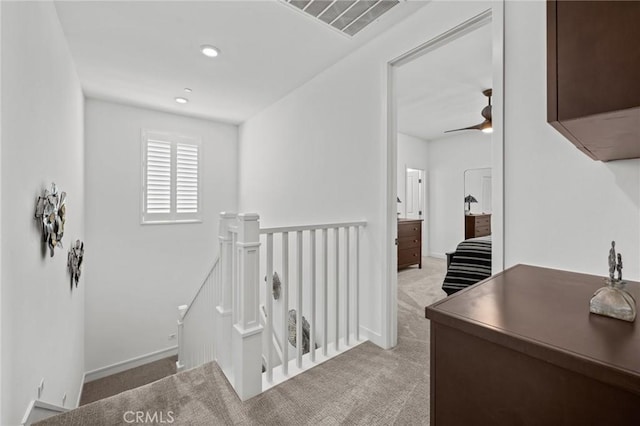 32404 Old Sage Dr, San Juan Capistrano, CA 92675 - corridor with an upstairs landing, light colored carpet, and baseboards