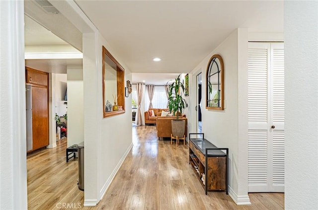 365 W Alameda Ave Unit 203, Burbank, CA 91506 - hallway featuring light wood-type flooring, baseboards, and recessed lighting