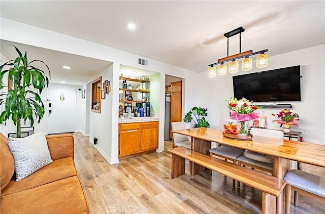365 W Alameda Ave Unit 203, Burbank, CA 91506 - dining room featuring light wood-style flooring, recessed lighting, and baseboards