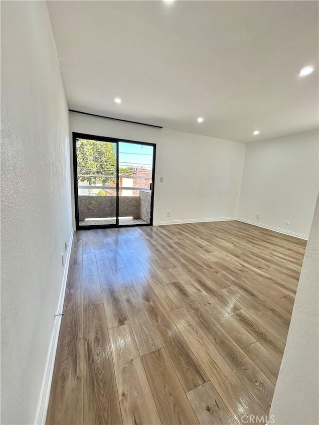365 W Alameda Ave Unit 203, Burbank, CA 91506 - unfurnished room featuring light wood-style flooring and recessed lighting