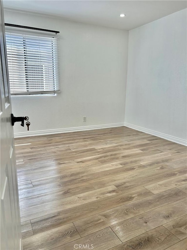 365 W Alameda Ave Unit 203, Burbank, CA 91506 - empty room featuring light wood-style flooring and recessed lighting