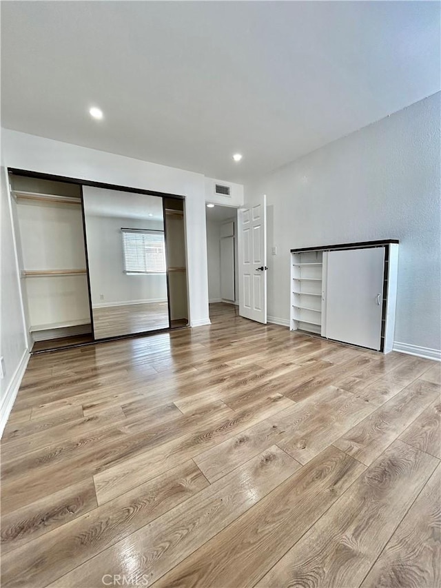 365 W Alameda Ave Unit 203, Burbank, CA 91506 - unfurnished bedroom with light wood-type flooring and recessed lighting