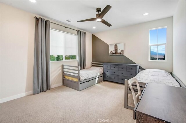 11837 Terra Vista Way, Sylmar, CA 91342 - bedroom with multiple windows, recessed lighting, light colored carpet, ceiling fan, and baseboards