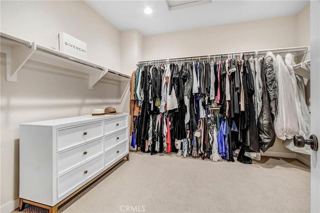 11837 Terra Vista Way, Sylmar, CA 91342 - walk in closet with carpet floors and attic access