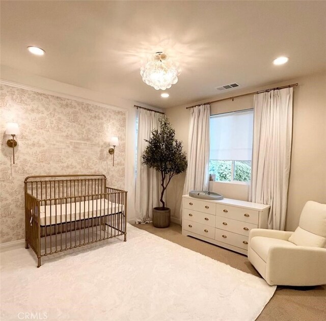 11837 Terra Vista Way, Sylmar, CA 91342 - carpeted bedroom with recessed lighting, a nursery area, and a chandelier
