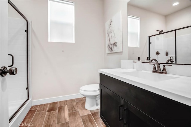 11837 Terra Vista Way, Sylmar, CA 91342 - full bath with a stall shower, toilet, vanity, wood finish floors, and baseboards