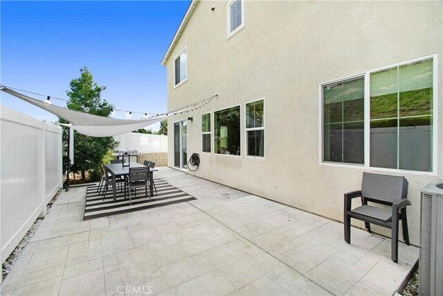 11837 Terra Vista Way, Sylmar, CA 91342 - view of patio / terrace featuring fence and outdoor dining area