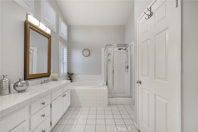 24632 Stagg St, West Hills, CA 91304 - bathroom with a garden tub, a shower stall, vanity, and tile patterned floors