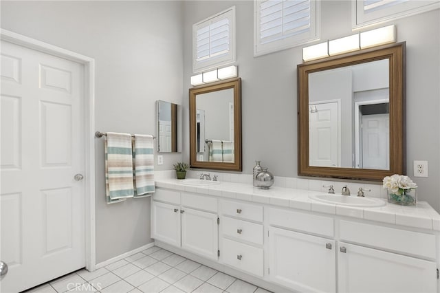 24632 Stagg St, West Hills, CA 91304 - bathroom featuring double vanity and tile patterned flooring