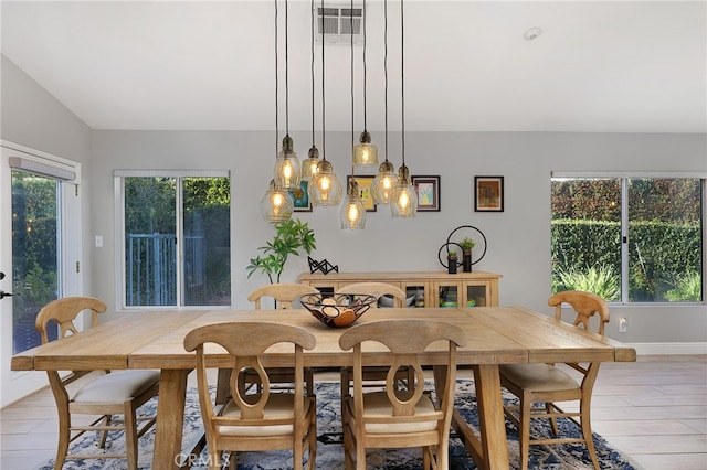 24632 Stagg St, West Hills, CA 91304 - dining area featuring vaulted ceiling and light wood-style floors