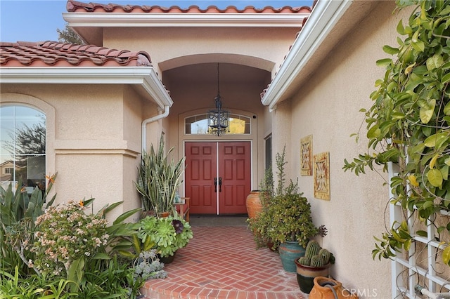 24632 Stagg St, West Hills, CA 91304 - property entrance with stucco siding and a tiled roof