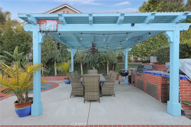 24632 Stagg St, West Hills, CA 91304 - view of patio / terrace with an outdoor kitchen, outdoor dining area, and a pergola