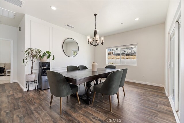 23900 Vista Way, Menifee, CA 92587 - dining space featuring a chandelier, recessed lighting, dark wood finished floors, and baseboards