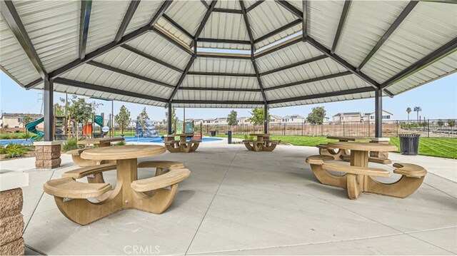 30051 Sunset Pier Dr, Menifee, CA 92584 - view of patio / terrace with a gazebo, fence, and outdoor dining space