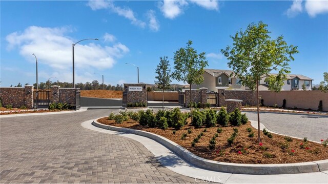 30051 Sunset Pier Dr, Menifee, CA 92584 - community / neighborhood sign with a gate and fence