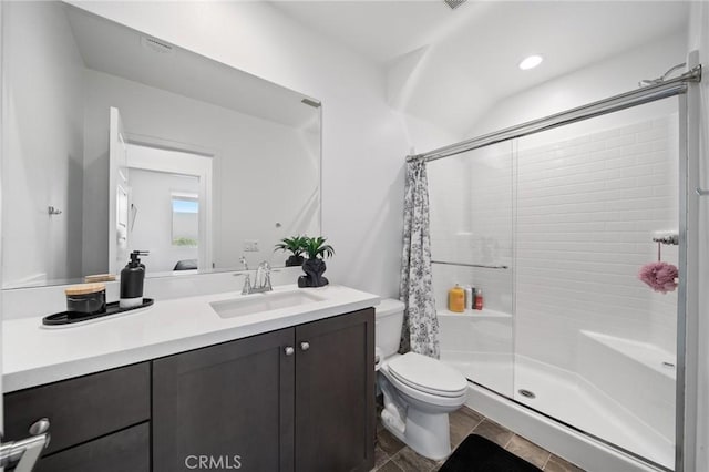11475 Sheridan Way, Beaumont, CA 92223 - full bathroom featuring a shower stall, toilet, vanity, and recessed lighting