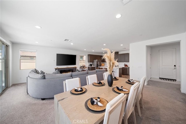 11475 Sheridan Way, Beaumont, CA 92223 - dining area featuring light colored carpet, recessed lighting, and baseboards