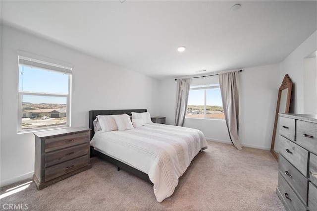 11475 Sheridan Way, Beaumont, CA 92223 - bedroom featuring light colored carpet, baseboards, and recessed lighting