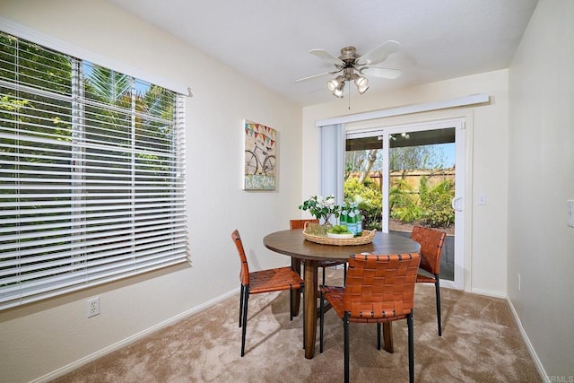 2935 Via Emerado, Carlsbad, CA 92009 - dining room with carpet floors, a ceiling fan, and baseboards