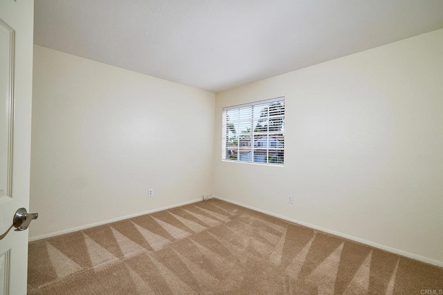 2935 Via Emerado, Carlsbad, CA 92009 - spare room featuring carpet floors and baseboards
