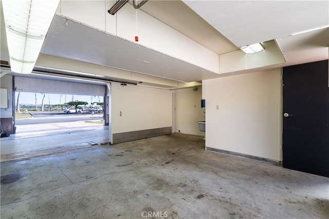 2405 Tustin Ave, Costa Mesa, CA 92627 - garage featuring baseboards