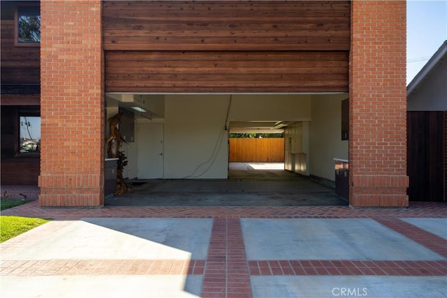 garage featuring fence