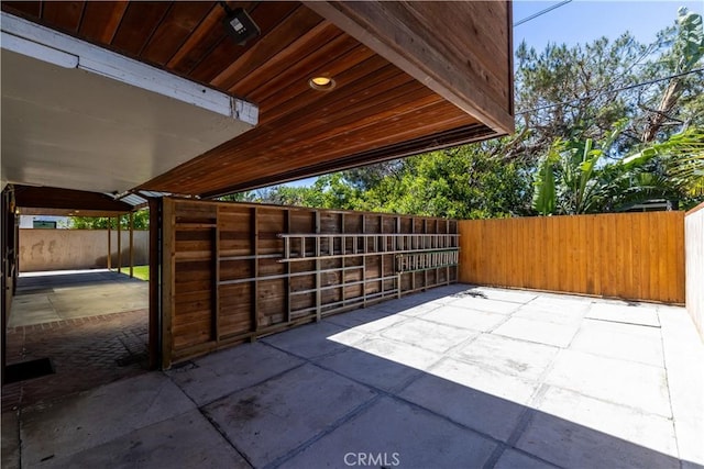 view of patio featuring an exterior structure and an outdoor structure