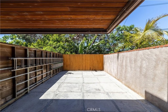 2405 Tustin Ave, Costa Mesa, CA 92627 - view of patio featuring an exterior structure and an outbuilding