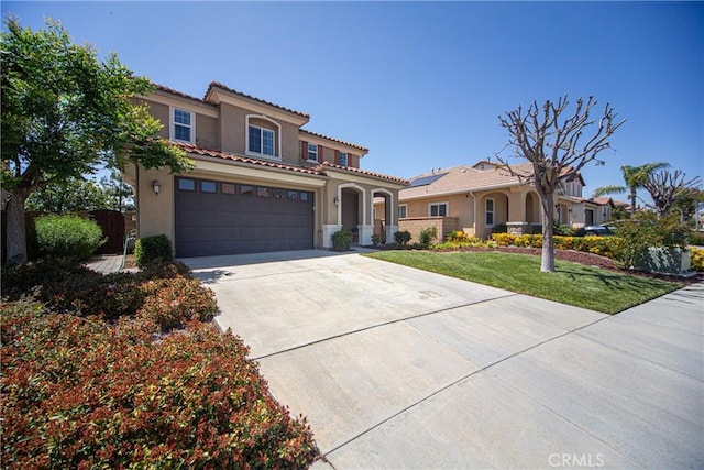 43075 Beamer Ct, Temecula, CA 92592 - mediterranean / spanish-style home with stucco siding, concrete driveway, and a tiled roof