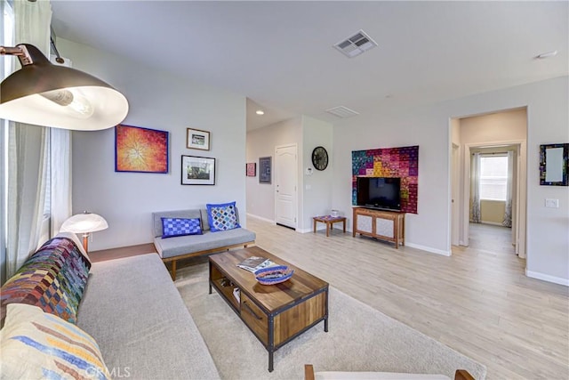 43075 Beamer Ct, Temecula, CA 92592 - living room with light wood-type flooring, baseboards, and recessed lighting