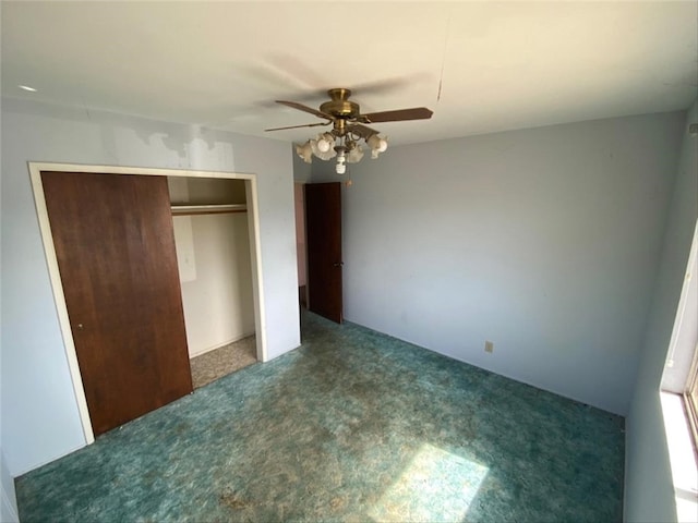 unfurnished bedroom featuring carpet, a closet, and ceiling fan