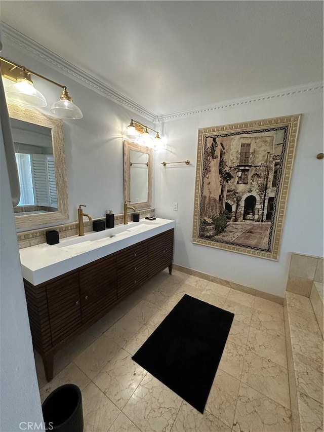 22564 Inspiration Pt, Canyon Lake, CA 92587 - bathroom with double vanity, marble look tile flooring, ornamental molding, and baseboards