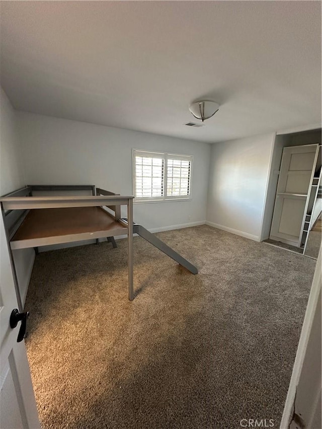 22564 Inspiration Pt, Canyon Lake, CA 92587 - unfurnished bedroom featuring carpet and baseboards