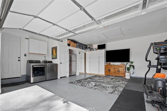 2514 N Tustin Ave Unit 71, Santa Ana, CA 92705 - garage featuring freestanding refrigerator and washing machine and clothes dryer