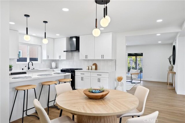 2514 S Rita Way, Santa Ana, CA 92704 - dining area featuring recessed lighting, light wood-style floors, and baseboards