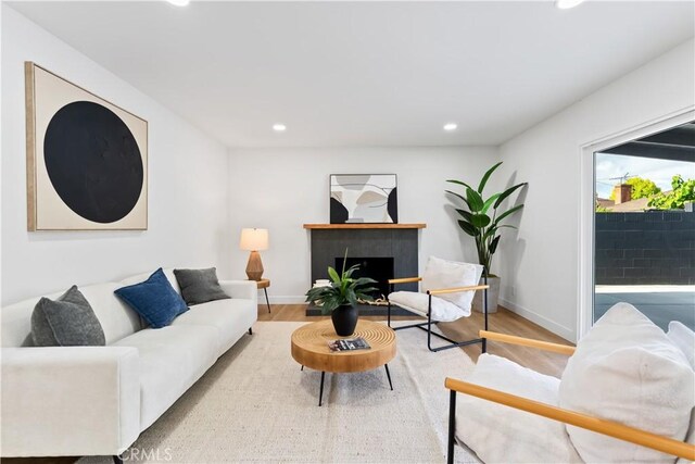 2514 S Rita Way, Santa Ana, CA 92704 - living area with recessed lighting, wood finished floors, and baseboards