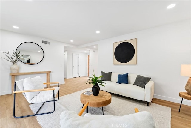 2514 S Rita Way, Santa Ana, CA 92704 - living area with recessed lighting, baseboards, and wood finished floors